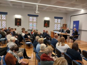Rozmowa redaktorów naukowych  tomu z Rafałem Reczkiem (z prawej)